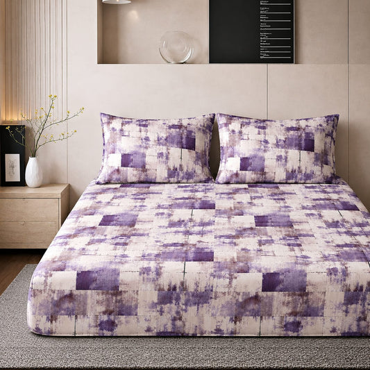 Mille Cart king size fitted bedsheet set in a purple and white abstract checkered pattern with two matching pillows.